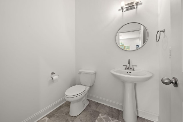 4049 Sadie Grace Way NW, Clarksville, TN 37042 - bathroom with toilet and baseboards