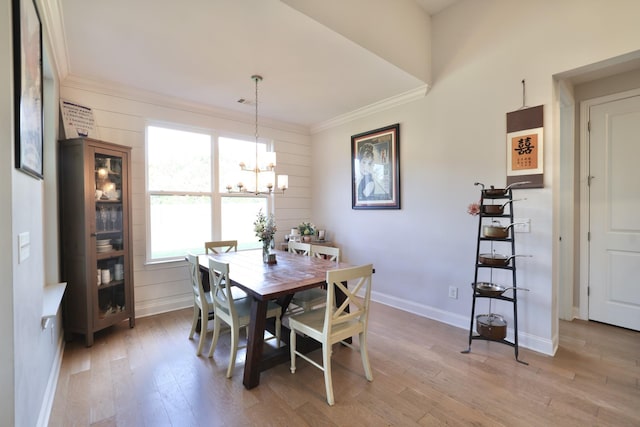 511 Oakvale Ln, Mount Juliet, TN 37122 - dining room featuring crown molding, light wood finished floors, and a chandelier