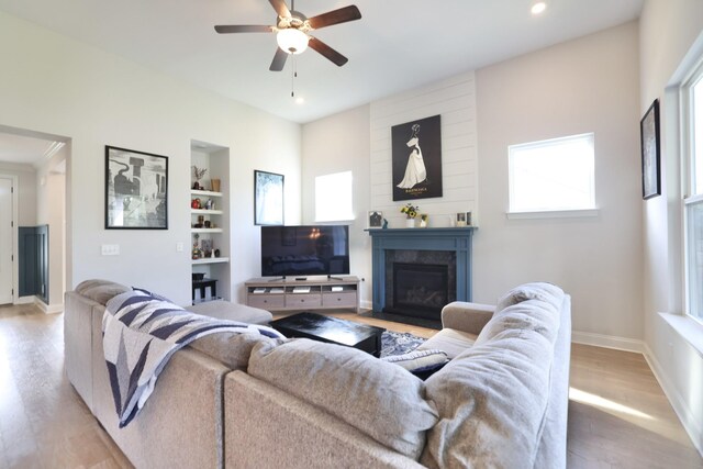 511 Oakvale Ln, Mount Juliet, TN 37122 - living area with light wood-style flooring, a ceiling fan, plenty of natural light, built in shelves, and recessed lighting