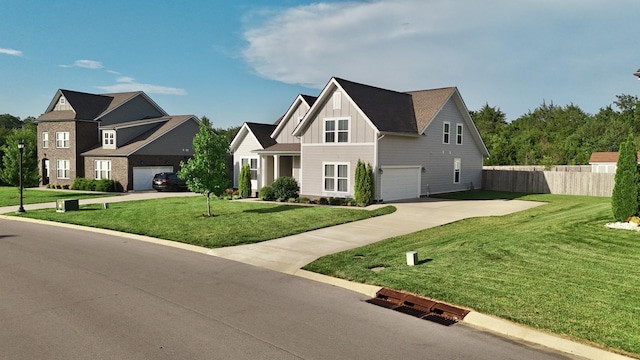 511 Oakvale Ln, Mount Juliet, TN 37122 - view of front of house featuring board and batten siding, concrete driveway, and an attached garage