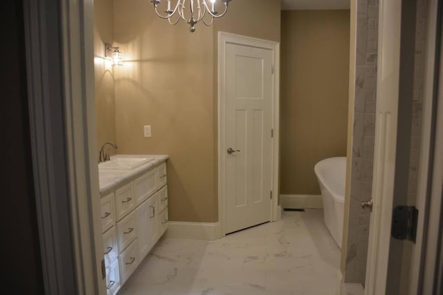 315 Gun Club Rd, Nashville, TN 37205 - full bath featuring marble finish floors, a chandelier, vanity, and a freestanding bath