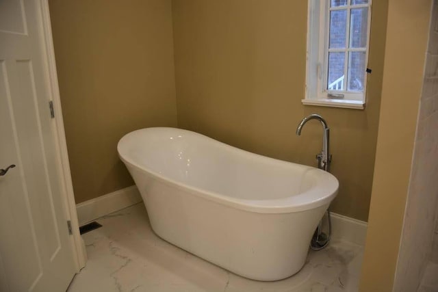 315 Gun Club Rd, Nashville, TN 37205 - bathroom featuring a soaking tub and marble finish floors