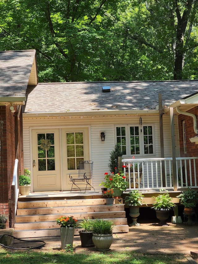 315 Gun Club Rd, Nashville, TN 37205 - back of house featuring a shingled roof, covered porch, and french doors