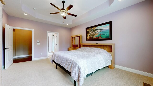 1007 Via Francesco Way, Spring Hill, TN 37174 - bedroom featuring carpet flooring, recessed lighting, a tray ceiling, and a ceiling fan