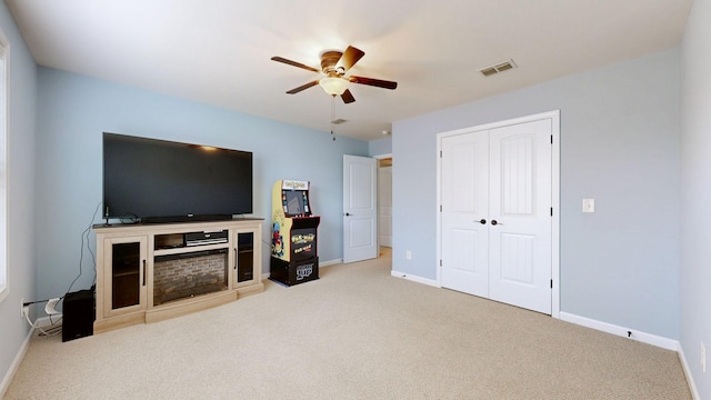 1007 Via Francesco Way, Spring Hill, TN 37174 - carpeted living room with ceiling fan and baseboards