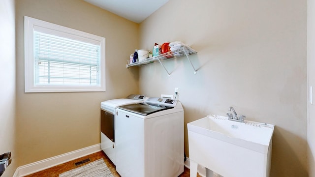 1007 Via Francesco Way, Spring Hill, TN 37174 - laundry room with separate washer and dryer and baseboards