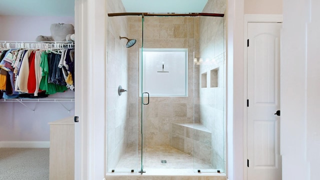 1007 Via Francesco Way, Spring Hill, TN 37174 - bathroom featuring a stall shower and a walk in closet