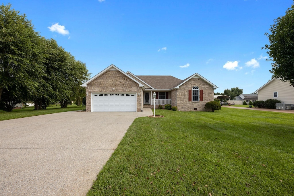 3019 Mcquiston Dr, Greenbrier, TN 37073 - ranch-style house with crawl space, a garage, brick siding, concrete driveway, and a front lawn