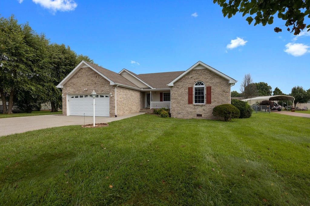 3019 Mcquiston Dr, Greenbrier, TN 37073 - ranch-style house featuring brick siding, driveway, a front yard, and crawl space