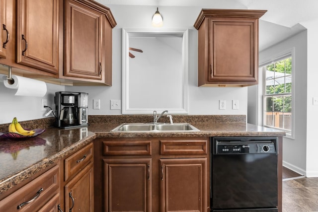 508 Oakmont Dr, Clarksville, TN 37042 - kitchen with black dishwasher, brown cabinetry, and ceiling fan