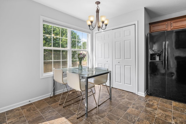 508 Oakmont Dr, Clarksville, TN 37042 - dining area with a chandelier and baseboards