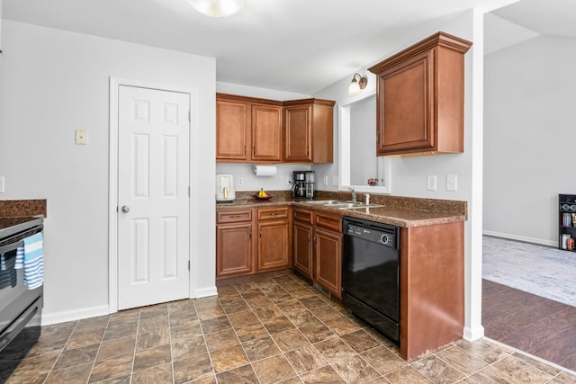 508 Oakmont Dr, Clarksville, TN 37042 - kitchen with dishwasher, dark countertops, range with electric stovetop, and brown cabinets