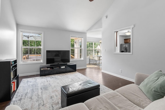 508 Oakmont Dr, Clarksville, TN 37042 - living room featuring healthy amount of natural light, dark wood-style flooring, and vaulted ceiling