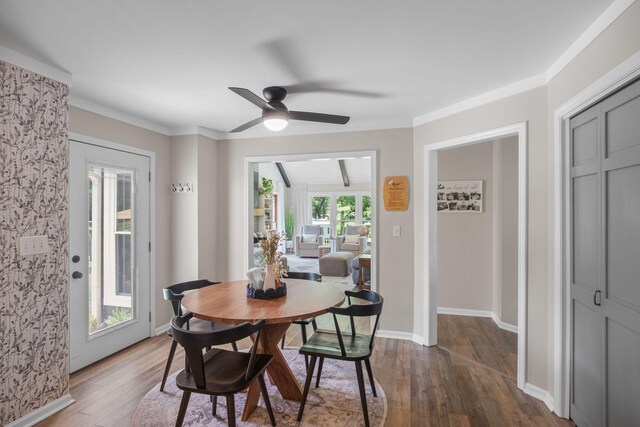 1400 Manor Rd, Columbia, TN 38401 - dining area with dark wood-style flooring, ceiling fan, and ornamental molding