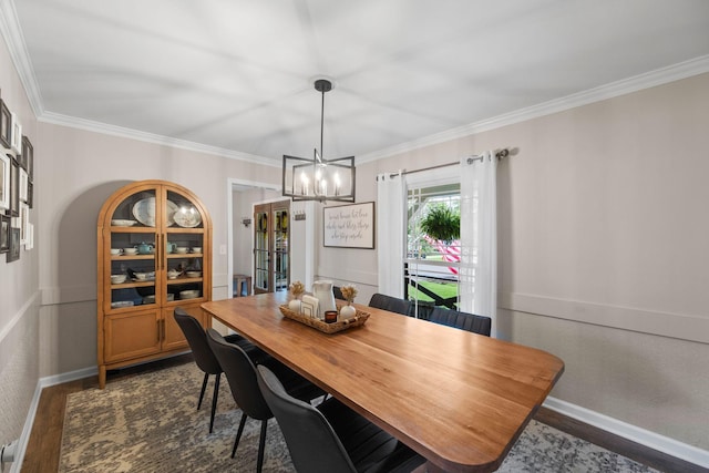 1400 Manor Rd, Columbia, TN 38401 - dining space with dark wood-style flooring, a chandelier, and ornamental molding