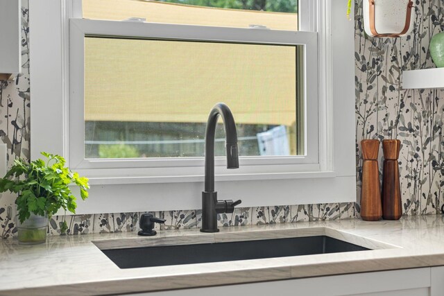1400 Manor Rd, Columbia, TN 38401 - kitchen view of a sink and white cabinets