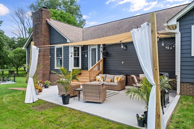 1400 Manor Rd, Columbia, TN 38401 - rear view of house featuring a chimney, a patio, a yard, and an outdoor living space