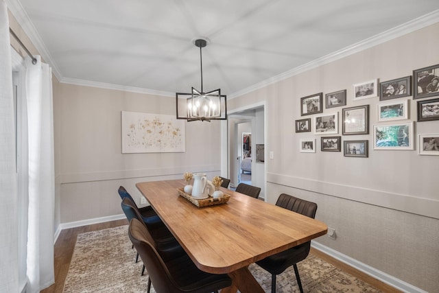 1400 Manor Rd, Columbia, TN 38401 - dining space featuring wood finished floors, a chandelier, and crown molding