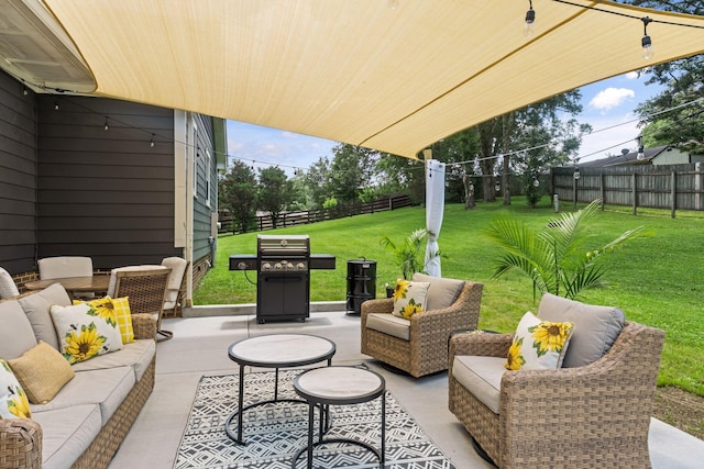 1400 Manor Rd, Columbia, TN 38401 - fenced backyard featuring an outdoor hangout area, a patio area, and grilling area