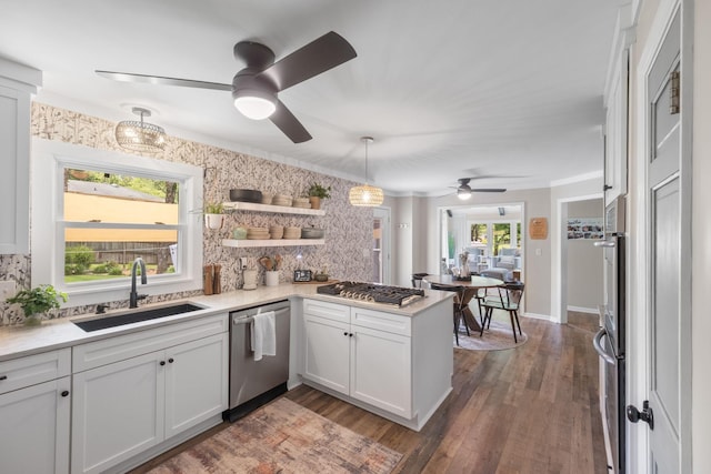 1400 Manor Rd, Columbia, TN 38401 - kitchen featuring stainless steel appliances, ceiling fan, decorative backsplash, and light countertops