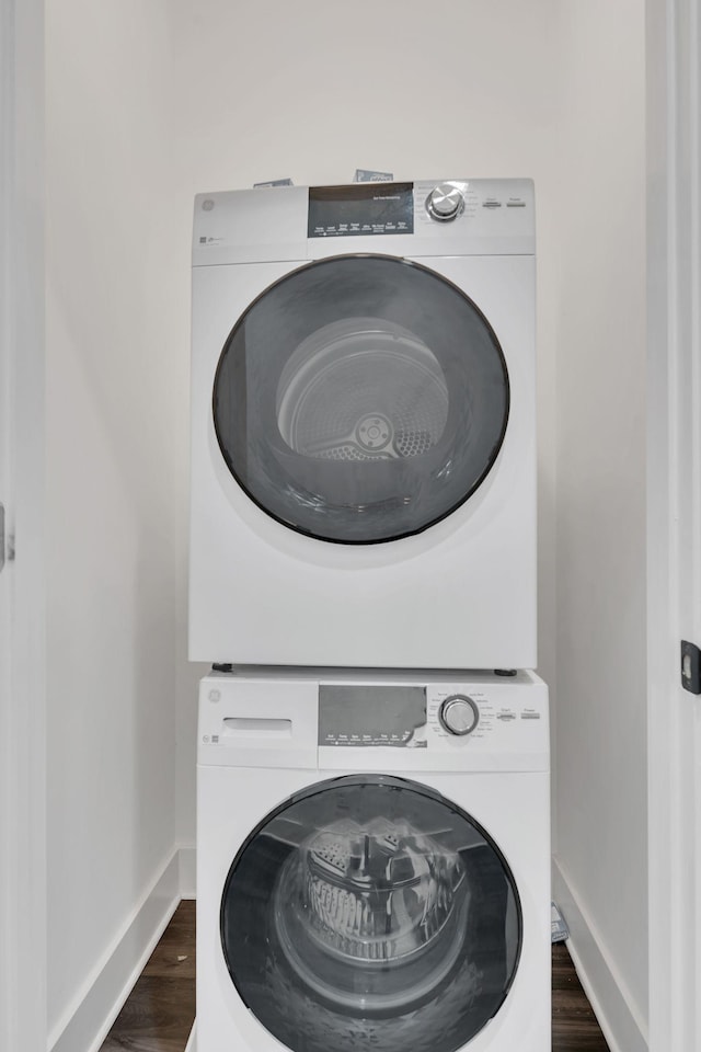 1320 5th Ave N Unit 4, Nashville, TN 37208 - laundry room featuring stacked washer / drying machine and dark wood-type flooring