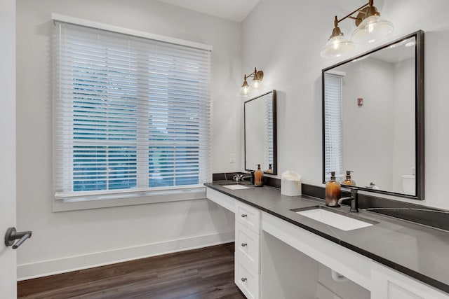 1320 5th Ave N Unit 4, Nashville, TN 37208 - full bathroom featuring double vanity and wood finished floors