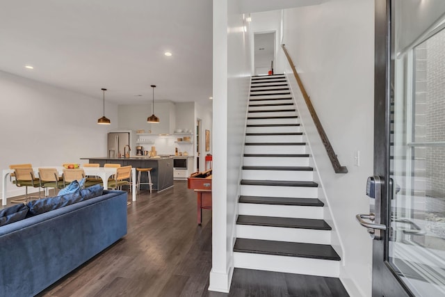1320 5th Ave N Unit 4, Nashville, TN 37208 - stairway featuring wood finished floors and recessed lighting