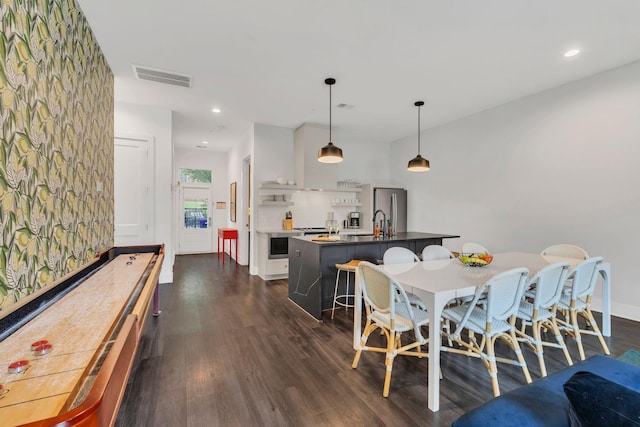 1320 5th Ave N Unit 4, Nashville, TN 37208 - dining room with dark wood-style flooring and recessed lighting