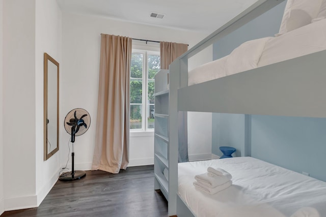 1320 5th Ave N Unit 4, Nashville, TN 37208 - bedroom with dark wood-style floors and baseboards