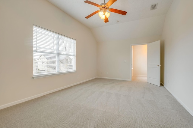 317 Sarava Ln, Smyrna, TN 37167 - empty room featuring lofted ceiling, light colored carpet, and a ceiling fan