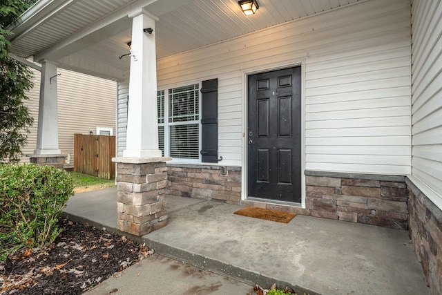317 Sarava Ln, Smyrna, TN 37167 - entrance to property featuring covered porch and stone siding