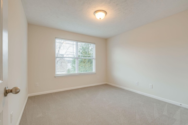 317 Sarava Ln, Smyrna, TN 37167 - carpeted empty room featuring baseboards and a textured ceiling