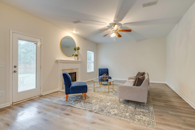 317 Sarava Ln, Smyrna, TN 37167 - sitting room featuring a ceiling fan, wood finished floors, and a high end fireplace