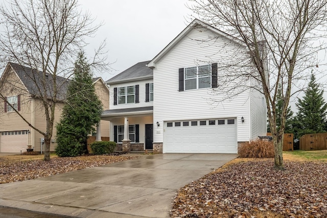 317 Sarava Ln, Smyrna, TN 37167 - traditional-style house with a garage, driveway, and a porch