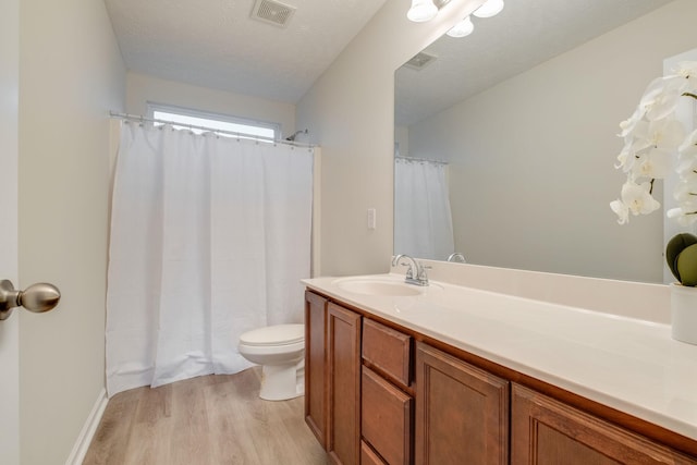 317 Sarava Ln, Smyrna, TN 37167 - bathroom with wood finished floors, vanity, and curtained shower