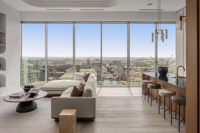 1616 W End Ave Unit 3304, Nashville, TN 37203 - bedroom featuring light wood-style flooring and a city view
