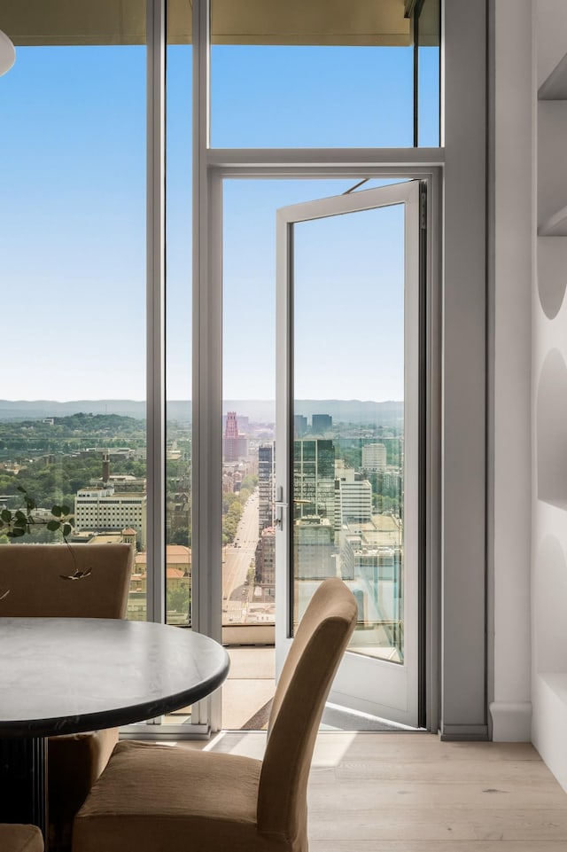 1616 W End Ave Unit 3304, Nashville, TN 37203 - dining room featuring wood finished floors and a view of city