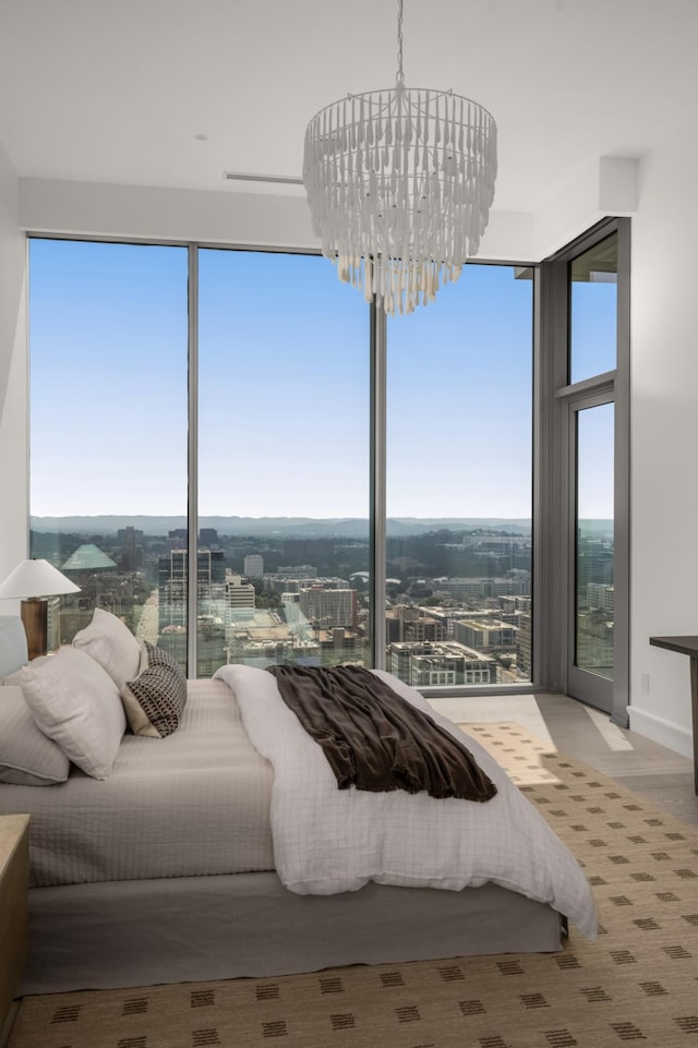 1616 W End Ave Unit 3304, Nashville, TN 37203 - bedroom with a chandelier and multiple windows