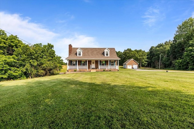 5455 Bales Rd, Cunningham, TN 37052 - new england style home with a porch, a detached garage, a chimney, and a front yard