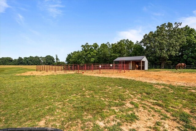 5455 Bales Rd, Cunningham, TN 37052 - view of yard featuring an exterior structure, an outbuilding, and a rural view