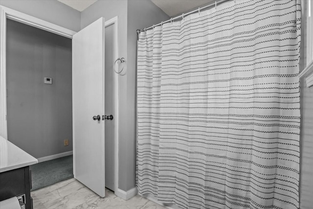 5455 Bales Rd, Cunningham, TN 37052 - full bath featuring marble finish flooring, vanity, and curtained shower