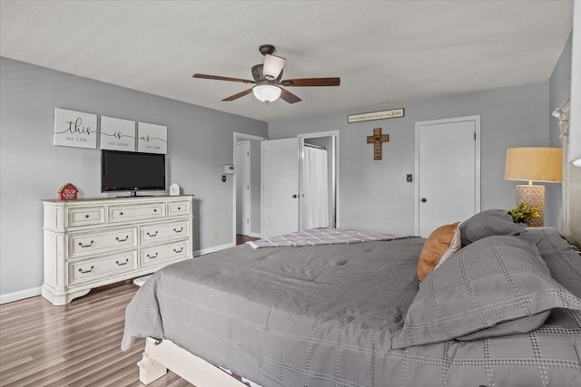 5455 Bales Rd, Cunningham, TN 37052 - bedroom featuring wood finished floors and ceiling fan