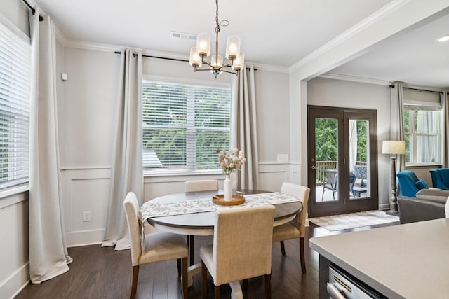 2717 Cloister Ln, Thompsons Station, TN 37179 - dining space with dark wood-style floors, a chandelier, plenty of natural light, and crown molding