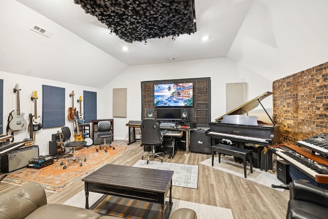 2717 Cloister Ln, Thompsons Station, TN 37179 - living room featuring wood finished floors and vaulted ceiling