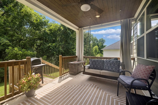 2717 Cloister Ln, Thompsons Station, TN 37179 - deck featuring ceiling fan, an outdoor hangout area, and view of wooded area