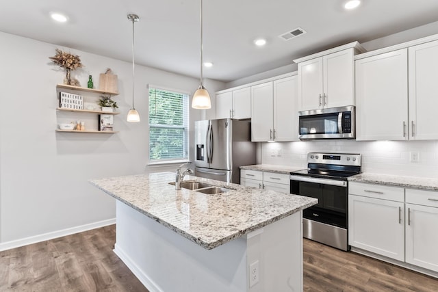 1045 Alta Vista Ln, Smyrna, TN 37167 - kitchen with stainless steel appliances, dark wood-type flooring, backsplash, white cabinets, and recessed lighting