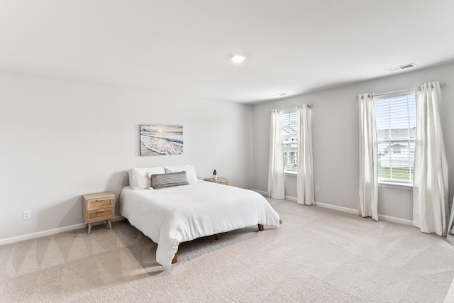 1045 Alta Vista Ln, Smyrna, TN 37167 - bedroom featuring baseboards and light colored carpet