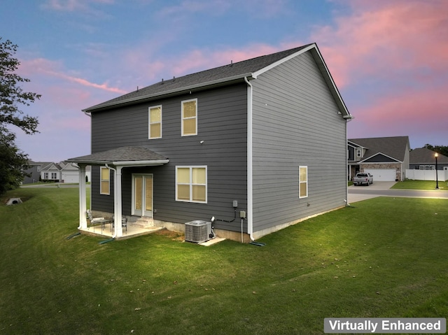 1045 Alta Vista Ln, Smyrna, TN 37167 - rear view of property with a lawn and a patio