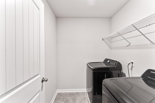 1045 Alta Vista Ln, Smyrna, TN 37167 - laundry area featuring washing machine and clothes dryer and baseboards