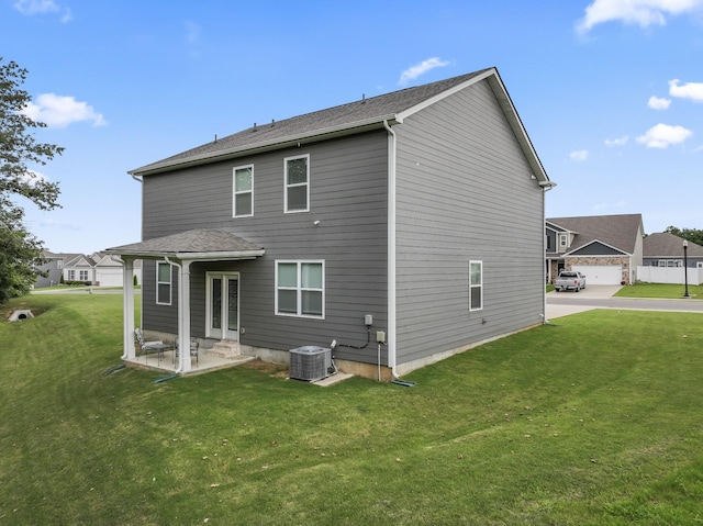 1045 Alta Vista Ln, Smyrna, TN 37167 - back of property with a yard, a patio, and entry steps